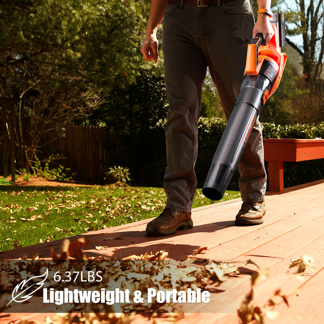 Close up of person blowing leaves from a wood deck, text reads 6.27 pounds, lightweight and portable.