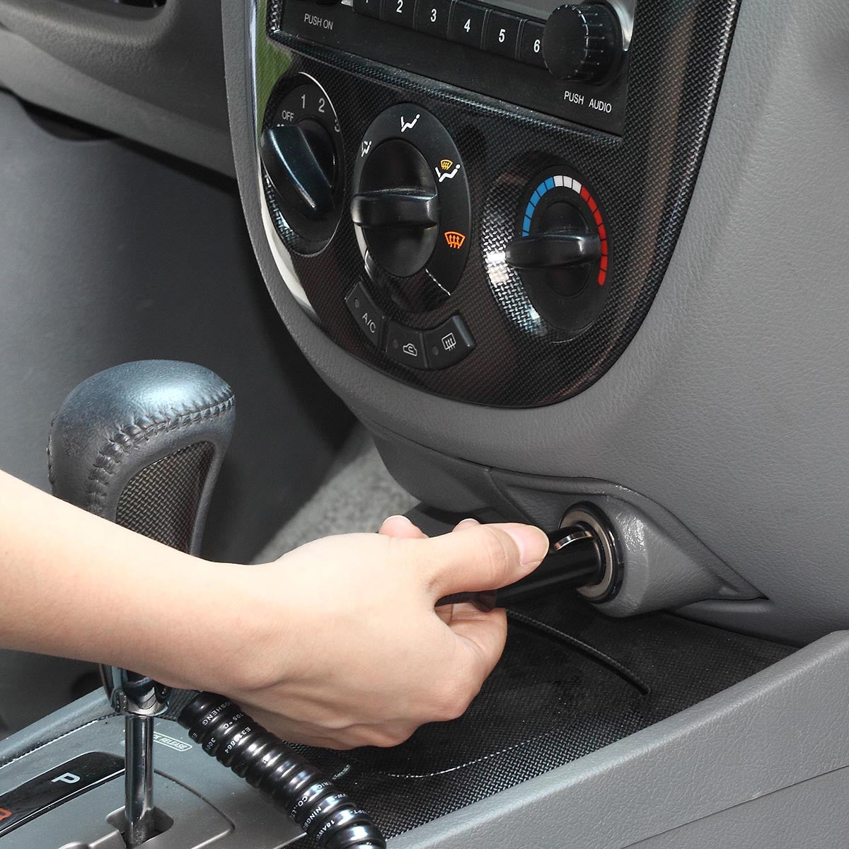 Plugs into 12V Auto Outlet