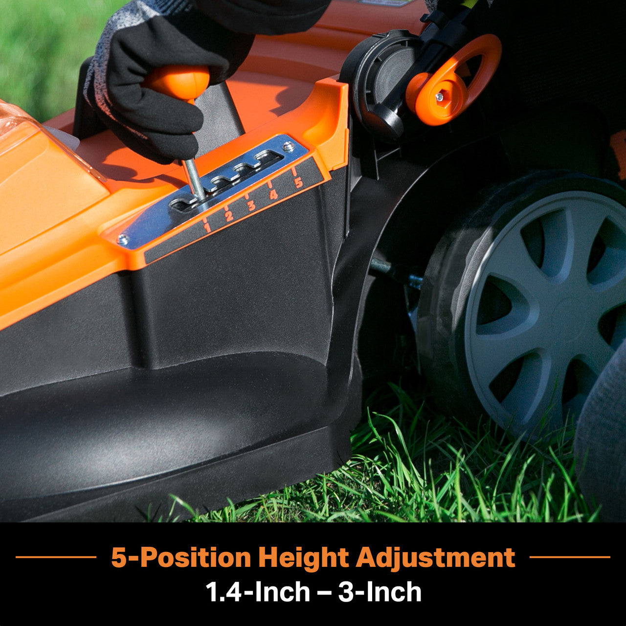 Person adjusting a lawn mower with height adjustment feature on grass