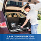 A man in a white t-shirt and jeans is shown using a black 3.5-inch car interior stain tool inside the open trunk of a maroon sedan, with a blue banner at the bottom reading '3.