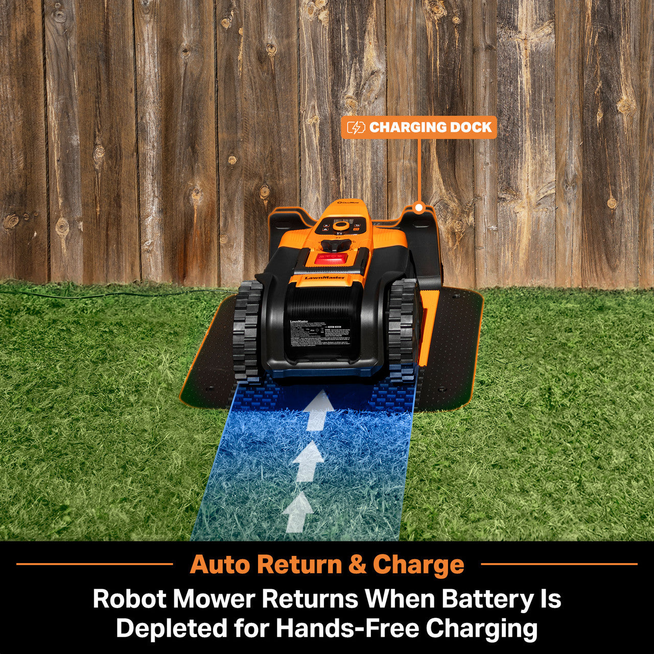 Robot lawn mower on a charging dock with grass and wooden fence background