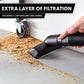 Vacuum hose with floor brush attachment demonstrating extra layer filtration capturing dirt and debris.
